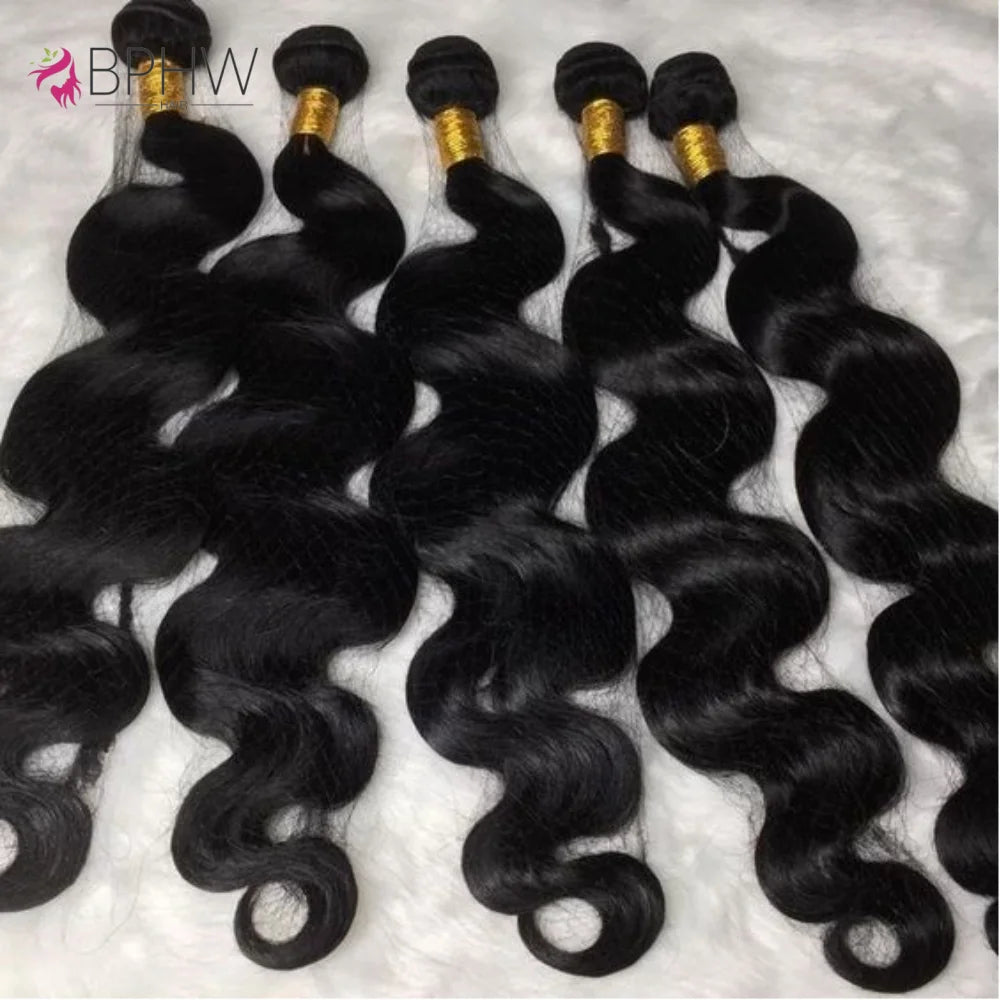 Luxe 30" Raw Human Hair | 12A Body Wave Bundle
Elevate your look with the ultimate in length and lustre. Our 12A Grade Body Wave Bundles offer a soft, natural S-pattern that provides effortless volume and a high-end, editoria